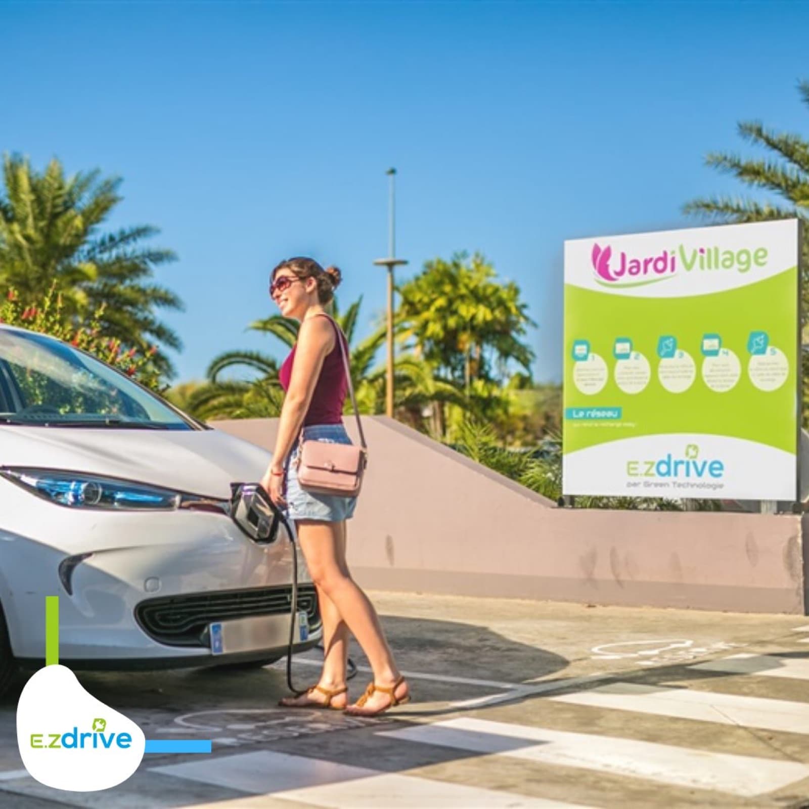 Borne publique EZdrive devant JardiVillage, Martinique — preuve du réseau historique